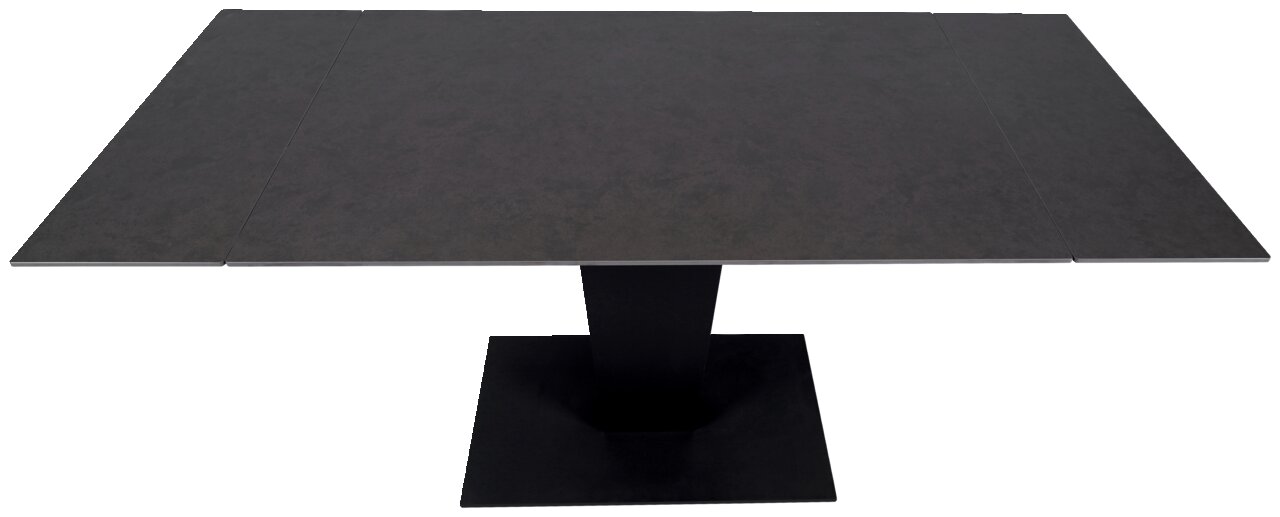 Moderner Esstisch mit dunkler Tischplatte und zentralem Standfuß, Ansicht von oben.