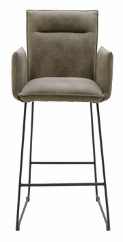 Frontansicht eines modernen Tresensessels mit gepolstertem Sitz und Rückenlehne in grauem Stoff, sowie schwarzen Metallbeinen.