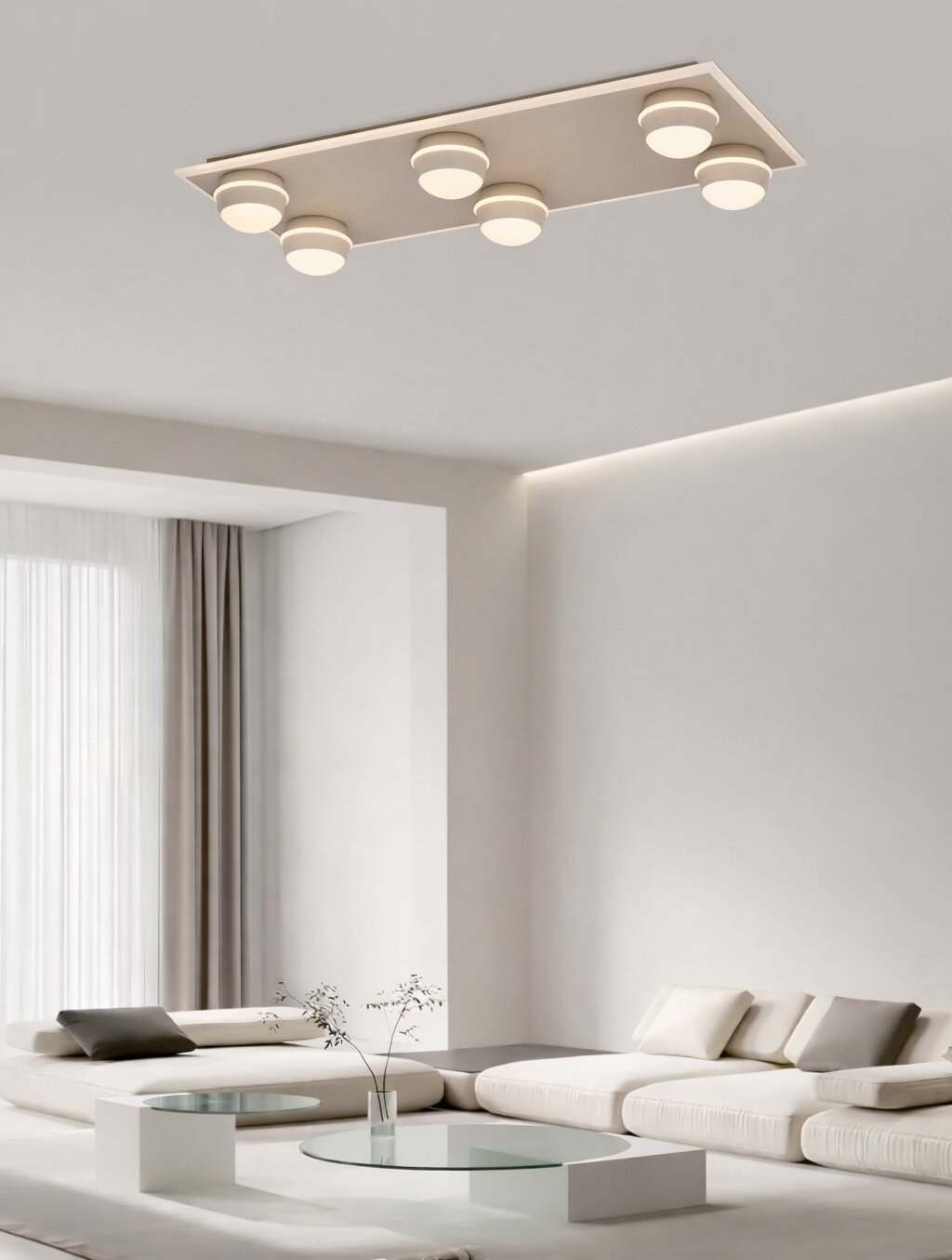 Moderne led-plafondlamp met zes ronde lichtelementen in een stijlvolle woonkamer, gezien van onderaf.