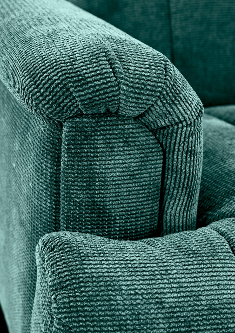 Nahaufnahme einer grünen, strukturierten Polsterung einer 2,5er-Sitzbank, seitliche Perspektive.
