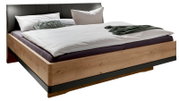 Futonbed met houten frame en gestoffeerd hoofdeinde, zijaanzicht