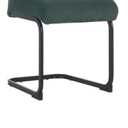 Seitenansicht eines XORA Schwingstuhls GONZO mit grünem Stoffbezug und schwarzem Metallgestell.