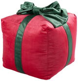 Rotes Zierkissen in Form eines Geschenks mit grüner Schleife, seitliche Perspektive