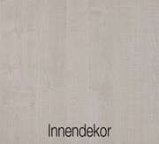 Nahaufnahme des Innendekors eines Schwebetürenschranks mit Holzmaserung in heller Farbe.