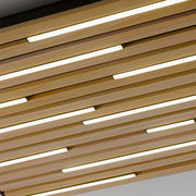 Moderne Wand- und Deckenleuchte Q-AKUS aus Holzlamellen mit integrierter LED-Beleuchtung, Perspektive von unten.