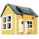 Holz-Steckhaus mit gelben Wänden und blauen Dach, Vorderansicht mit Fenstern und Tür, geeignet für Kinder ab 12 Monaten.