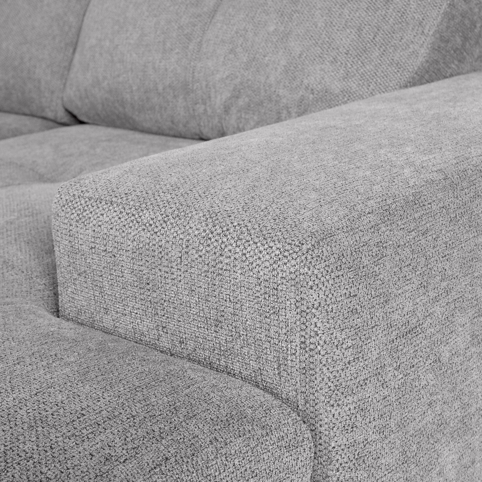 Nahaufnahme einer grauen Stoff-Rundecke mit Armlehne, seitliche Perspektive