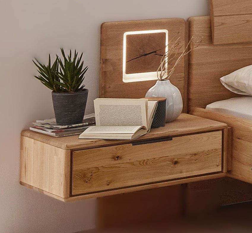 Holz-Nachtkonsole mit Schublade, dekoriert mit Pflanze, Büchern und Vase, seitliche Perspektive
