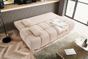 Schlafsofa 2-Sitzer in beige, von oben fotografiert, mit Kissen und Decke dekoriert, in einem modernen Wohnzimmer.