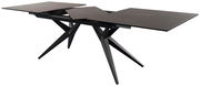 Moderner ausziehbarer Esstisch mit schwarzer Tischplatte und schrägen Beinen, seitliche Perspektive