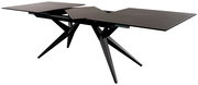Moderner ausziehbarer Esstisch mit schwarzer Tischplatte und schrägen Beinen, seitliche Perspektive