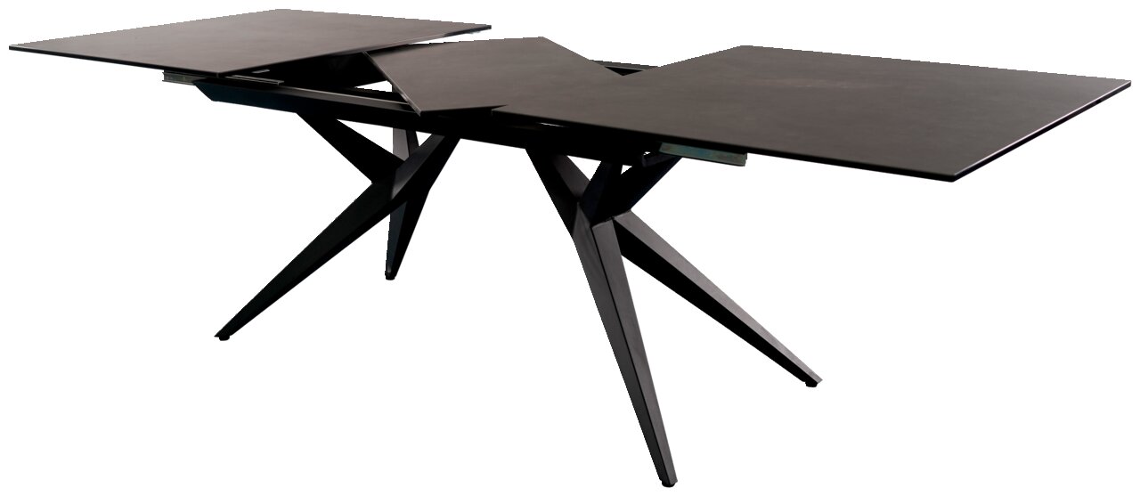 Moderner ausziehbarer Esstisch mit schwarzer Tischplatte und schrägen Beinen, seitliche Perspektive