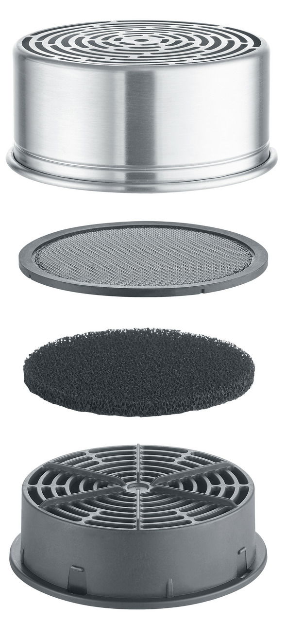 Explosionsansicht eines rauchfreien Raclette-Filters mit mehreren Schichten aus Metall und Kunststoff, seitliche Perspektive.
