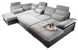 Großes, modernes Ecksofa in U-Form mit grauem Stoffbezug und schwarzen Lederakzenten, aus der Vogelperspektive fotografiert. Inklusive Kopfstützen und dekorativen Kissen, ideal für geräumige Wohnzimmer.