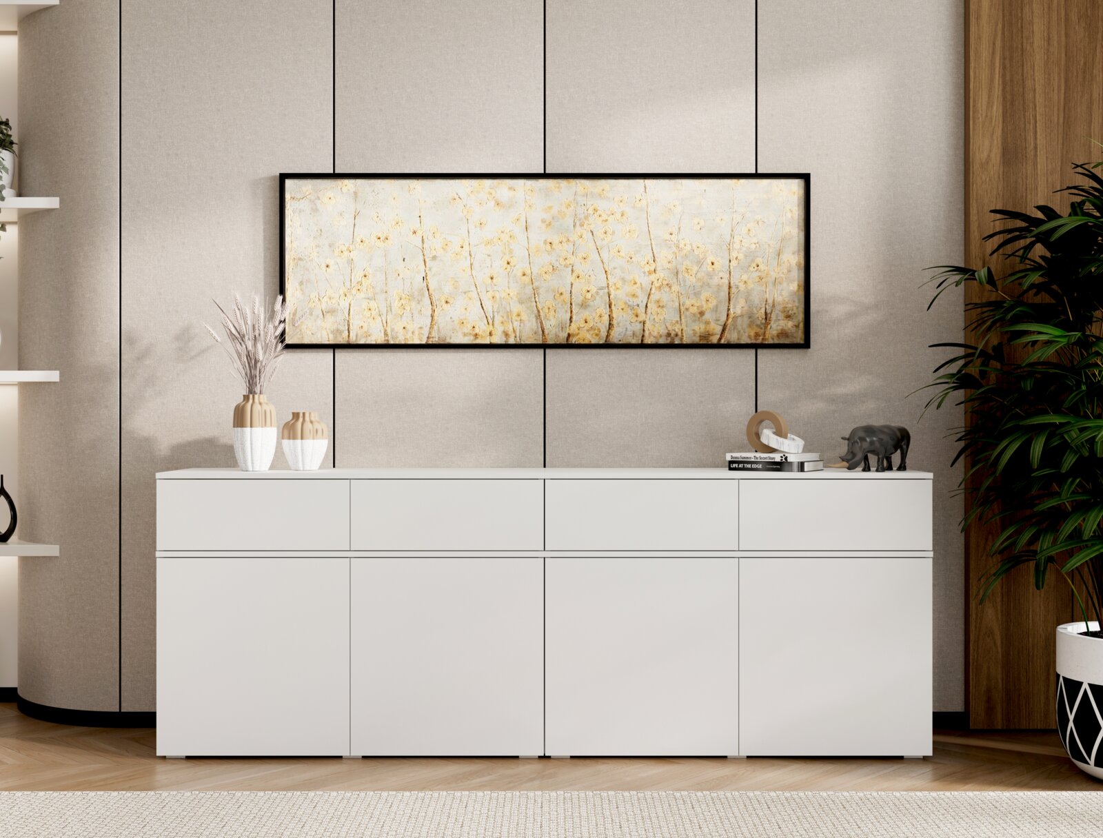 Frontalansicht eines horizontalen Wandbilds im schwarzen Rahmen mit zartem Blüten-/Gräsermotiv in Beige und Gold über einem weißen Sideboard in modernem Wohnraum.