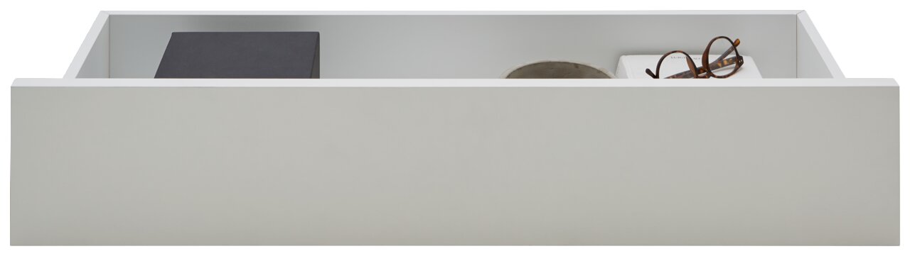 Dieter Knoll Innenschublade CORTINA Weiße Innenschublade, frontal betrachtet, mit Gegenständen wie einer Brille und einem Buch.