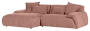 Beige hoekbank met verschillende kussens, zijaanzicht