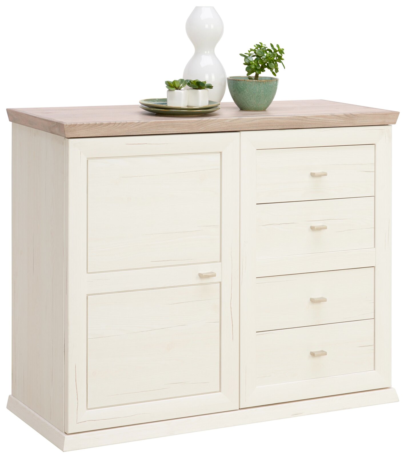 Weiße Kommode mit Holzplatte, links zwei Türen, rechts vier Schubladen, dekoriert mit Pflanzen und Vase, Perspektive von vorne links.
