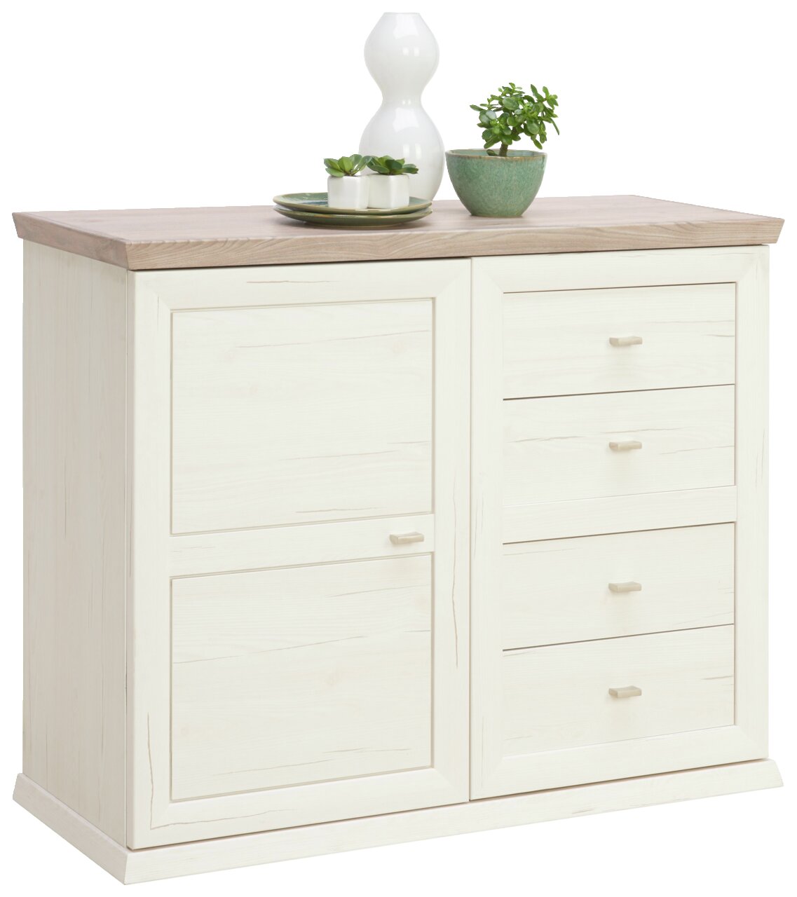 Weiße Kommode mit Holzplatte, links zwei Türen, rechts vier Schubladen, dekoriert mit Pflanzen und Vase, Perspektive von vorne links.
