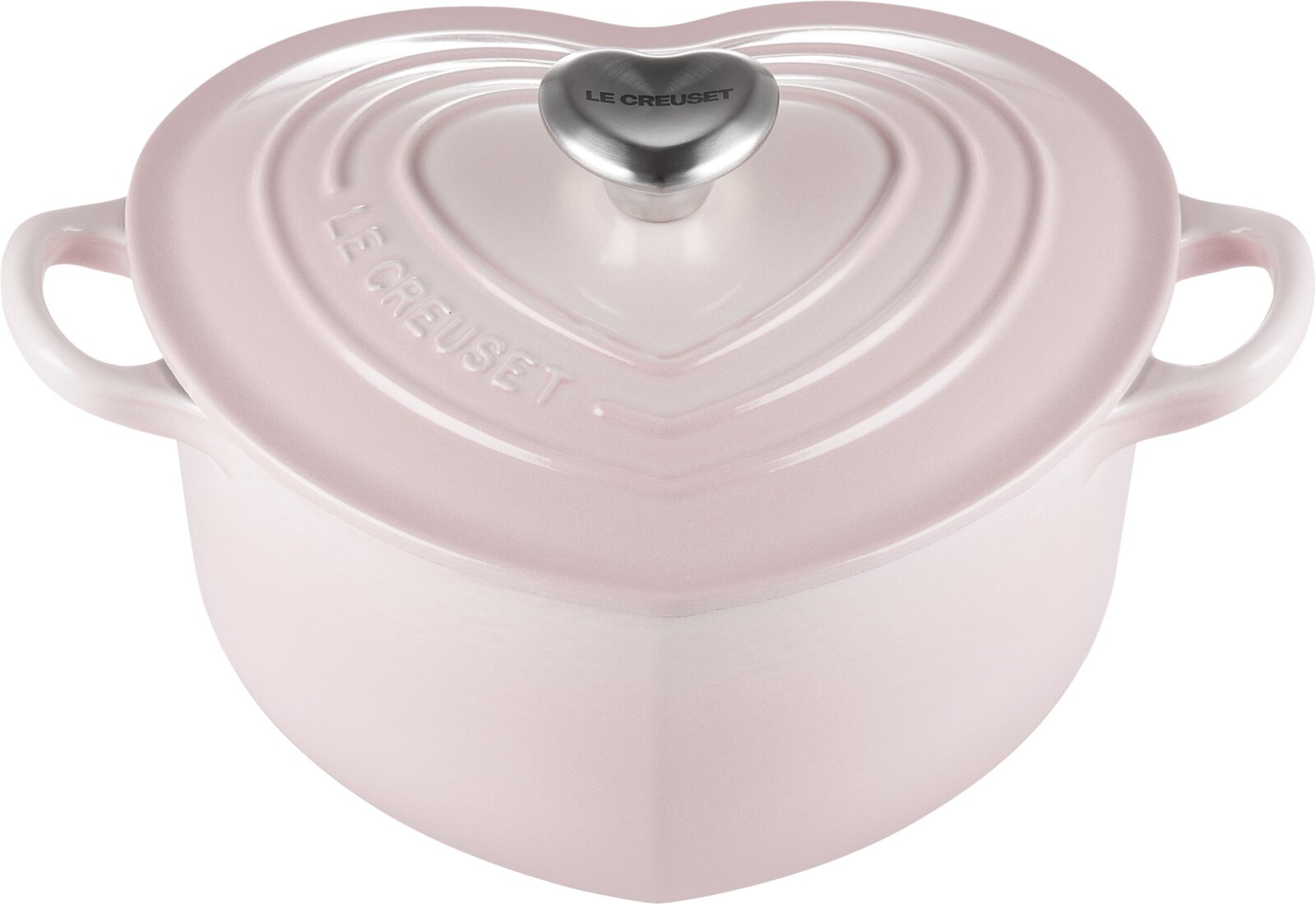Rosa Le Creuset Herz-Bräter aus emailliertem Gusseisen mit Deckel und Edelstahlknauf, Draufsicht leicht von vorn, freigestellt auf weißem Hintergrund