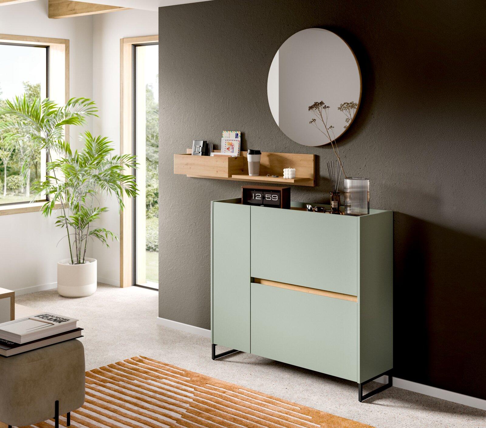 MID.YOU Schuhkommode DRIVE Modernes Sideboard in Salbeigrün mit schwarzem Metallgestell und Holzdetails, in einem hellen Wohnraum unter einem runden Wandspiegel – Perspektive: leicht schräg von vorn rechts.