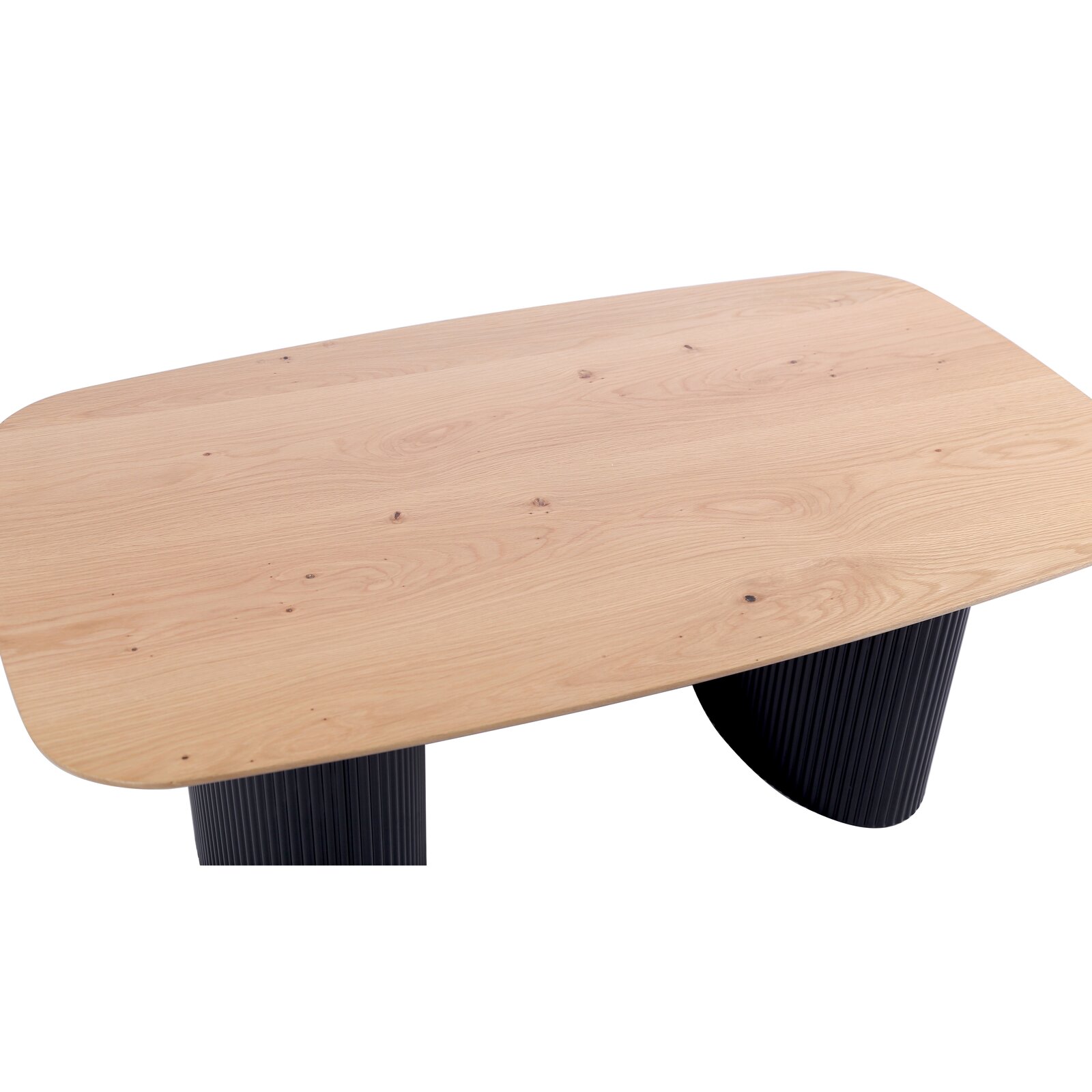 Moderner Couchtisch mit rechteckiger Holzplatte und gerippten, dunklen Beinen, aus der Vogelperspektive betrachtet.