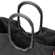 Close-up van een zwarte Loopshopper met stevige, ovale handvatten en een vak met ritssluiting, gezien van bovenaf.
