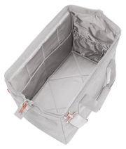 Graue Tasche mit roségoldenem Reißverschluss, von oben betrachtet, zeigt geräumiges Innenfach und elastische Seitentasche.