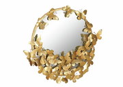 Runder Wandspiegel mit goldenen Schmetterlingen verziert, aus der Frontalperspektive betrachtet.
