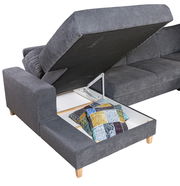 Graue Wohnlandschaft ANABELLE mit Stauraum, geöffnete Perspektive, zeigt Kissen im Fach.