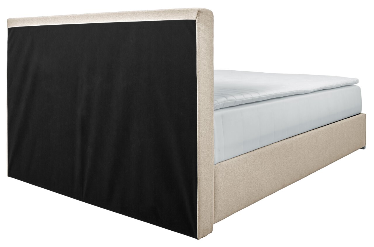 Boxbed 140 in zijaanzicht met een beige frame en een zwart hoofdeinde.