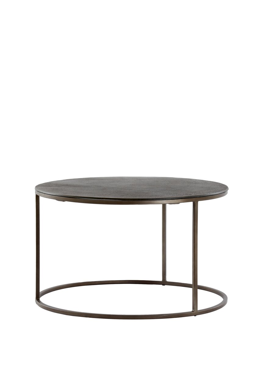 Ronde salontafel met donker tafelblad en filigraan metalen onderstel, gezien vanaf de zijkant.