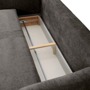 Innenansicht eines Funktionssofas mit geöffneter Stauraumfunktion, Perspektive von oben.