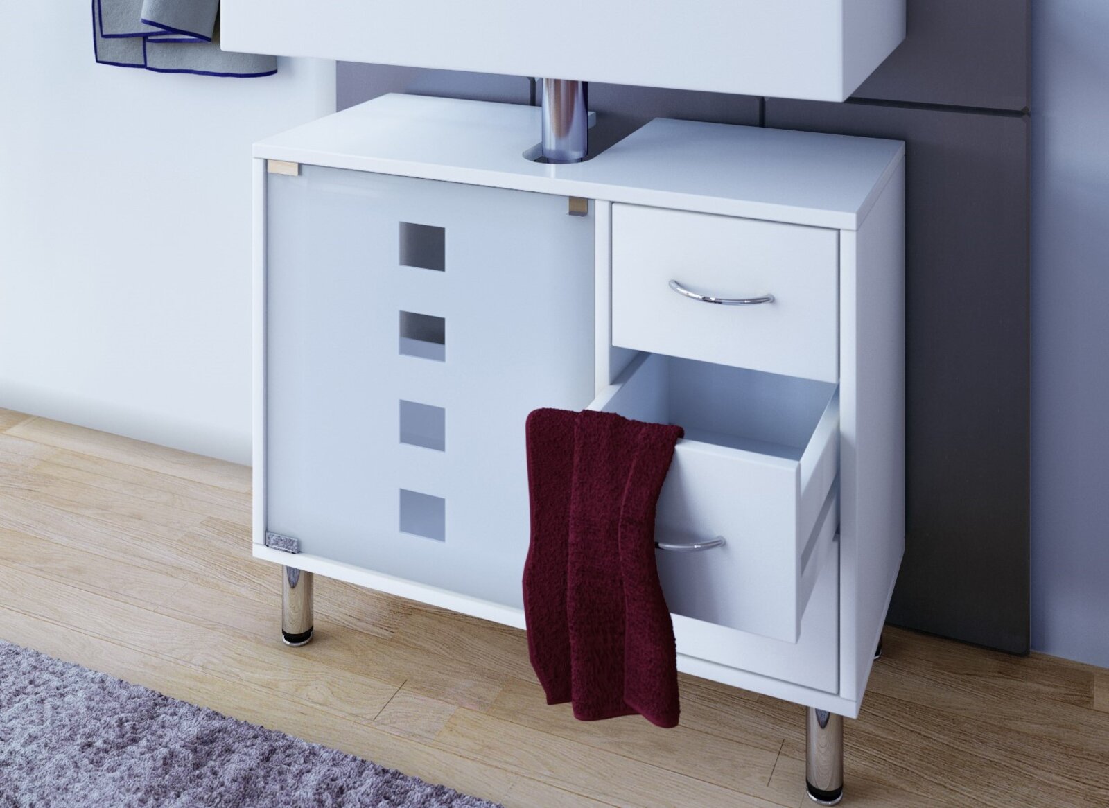 Weißer Badezimmer-Waschtischunterschrank mit Schubladen, offener Schublade und Handtuch, Frontansicht leicht von rechts in modernem Bad