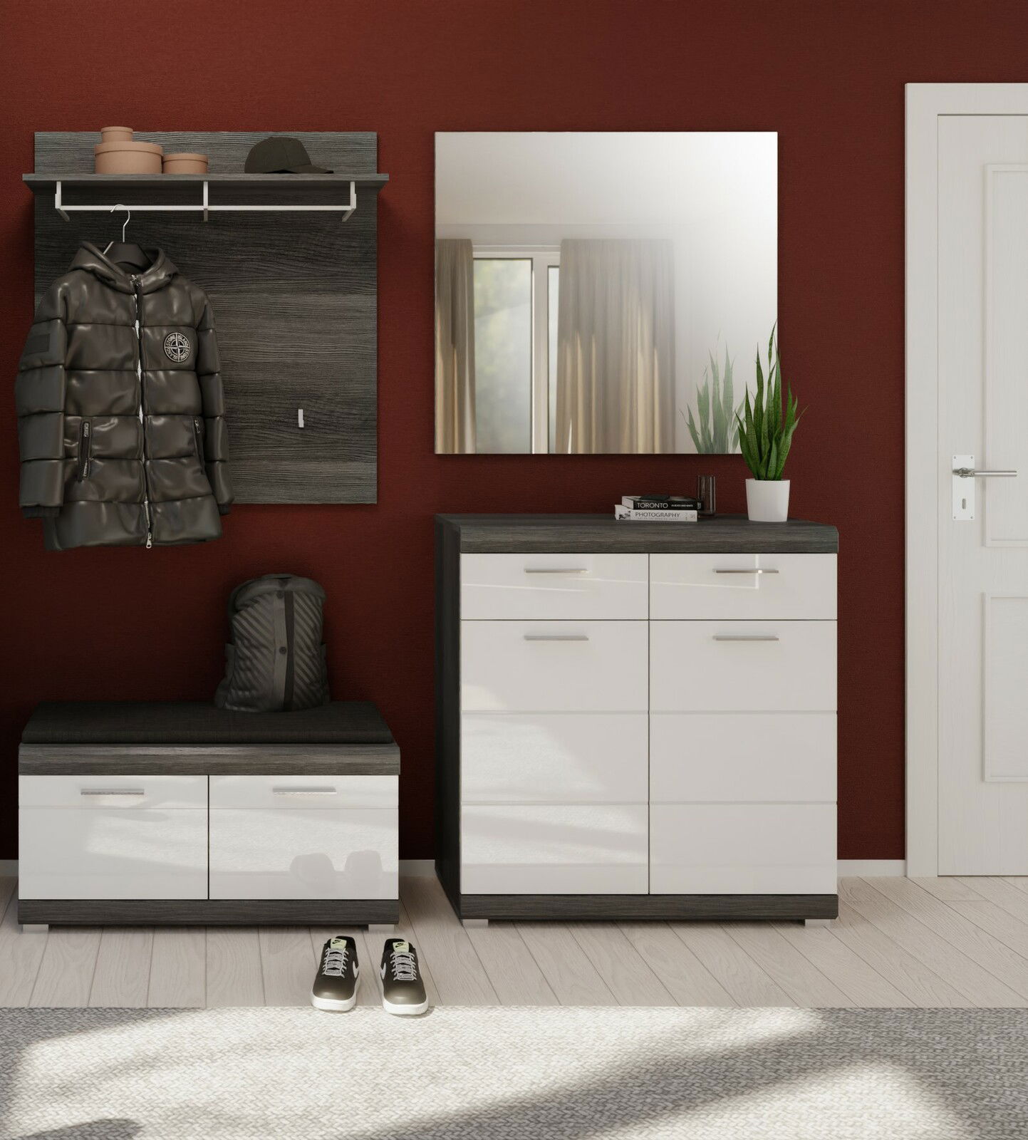 Moderner Flur mit Garderoben-Set bestehend aus Schuhschrank, Garderobenschrank, Spiegel und Garderobenbank in dunklem Holz und Weiß, frontal betrachtet.