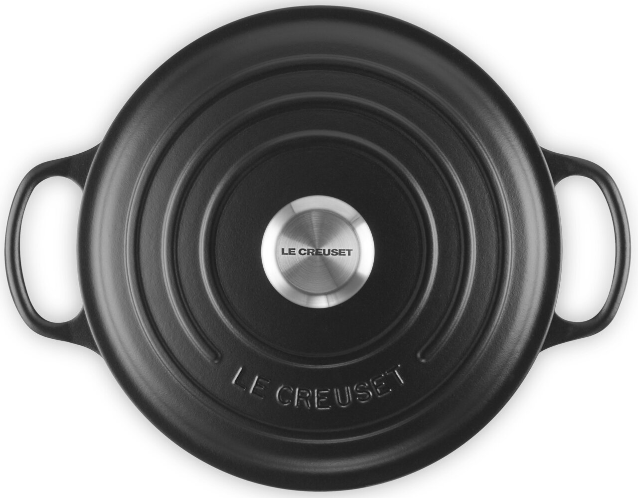 Zwarte sauteerpan van 24 cm, gezien van bovenaf, met twee handgrepen en het Le Creuset-logo op het deksel