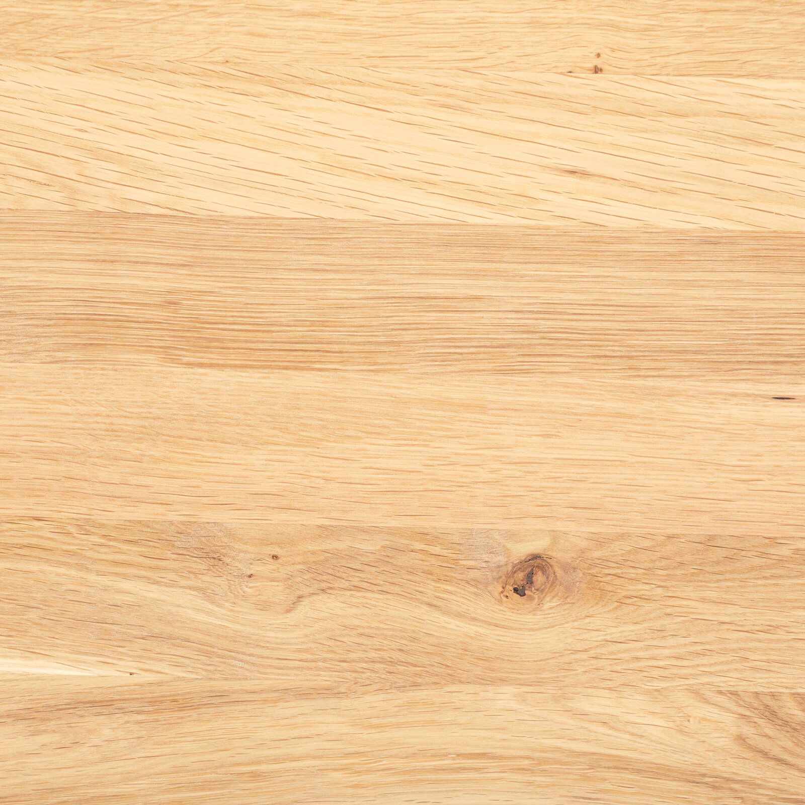 Nahaufnahme einer hellen Holzoberfläche mit natürlicher Maserung, von oben betrachtet.