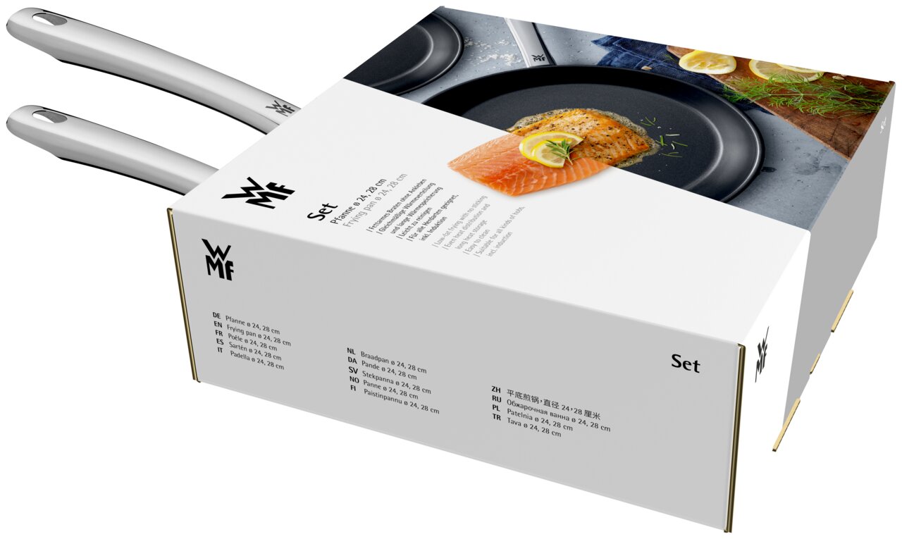 Verpackung des Pfannensets 24/28 cm Nordics von WMF, schräg von oben fotografiert, mit Abbildung von Pfannen und Lachsgericht.