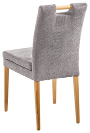 Rückansicht eines grauen Stuhls mit Holzbeinen und einem Holzgriff an der Rückenlehne