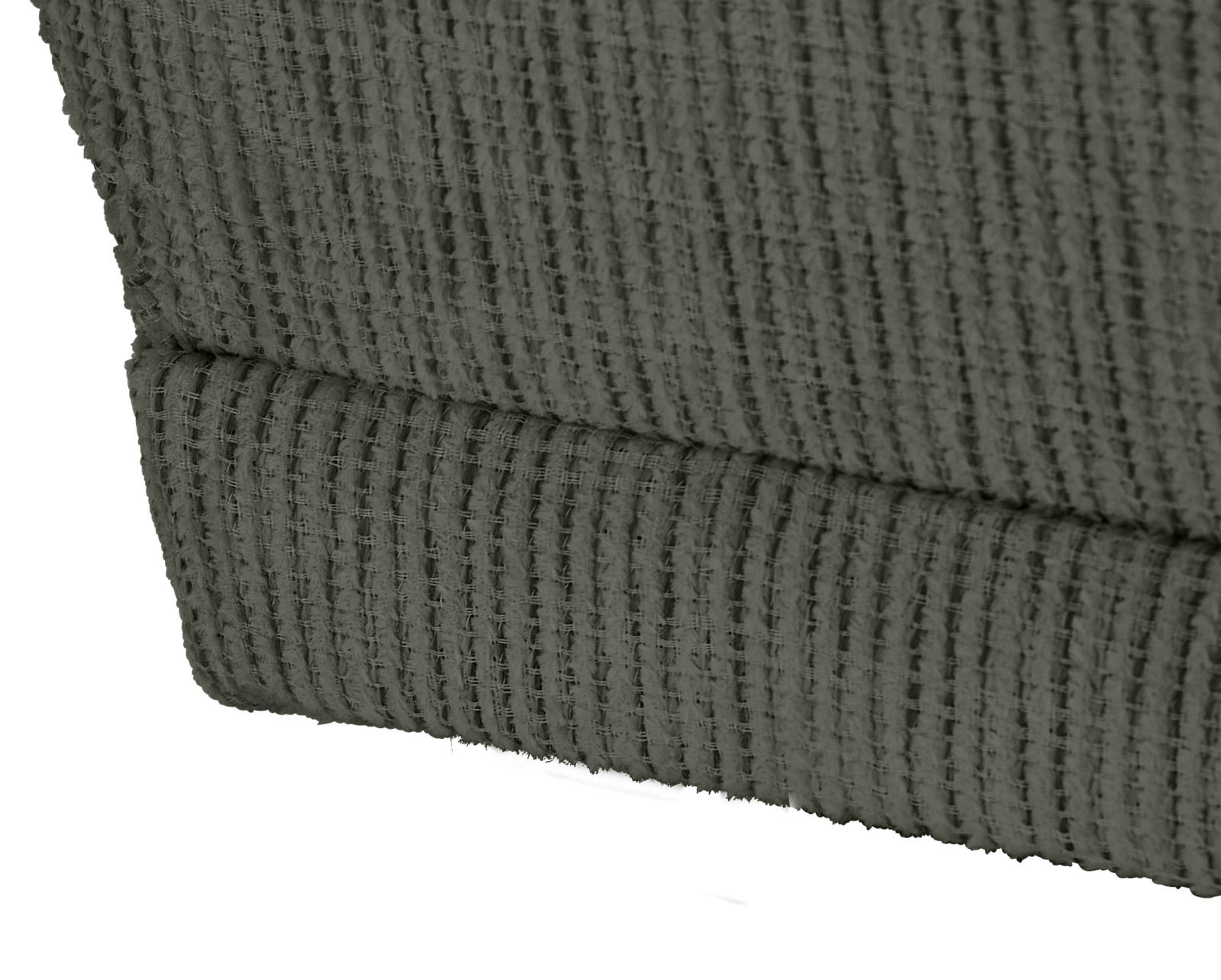 Nahaufnahme eines strukturierten, grünen Stoffes einer Recamiere, seitliche Perspektive