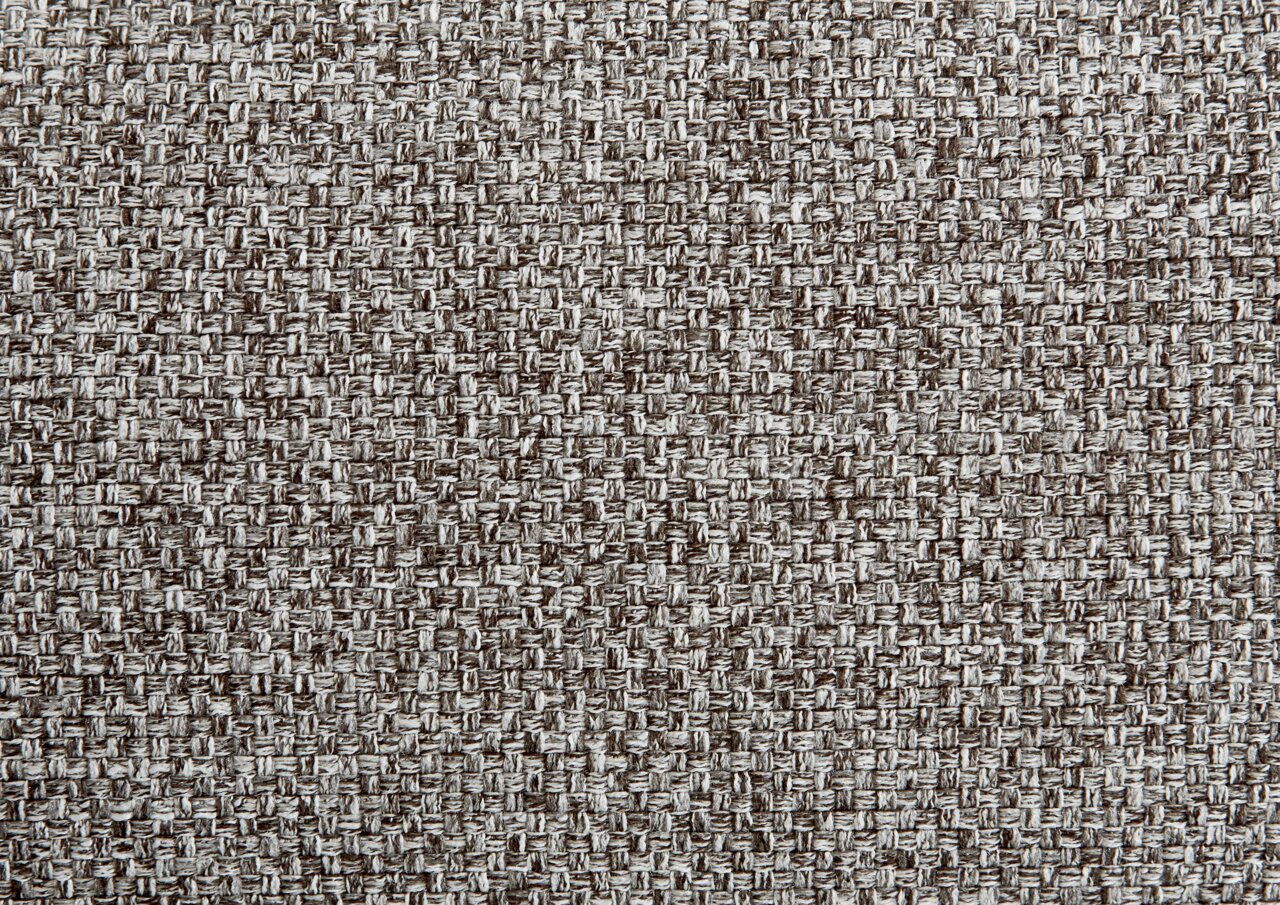 Beldomo System Sessel VILLACH S Nahaufnahme eines grauen, strukturierten Polsterstoffs in gewebter Optik.