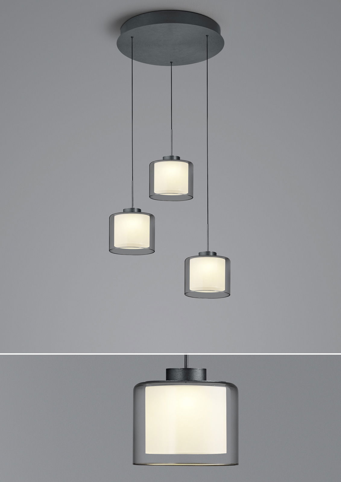 Dreifache LED-Pendelleuchte KLARA mit zylindrischen, weißen Schirmen, von unten betrachtet.