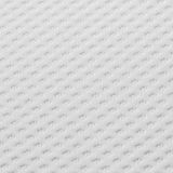 Nahaufnahme eines weißen, strukturierten Matratzentoppers in Draufsicht.