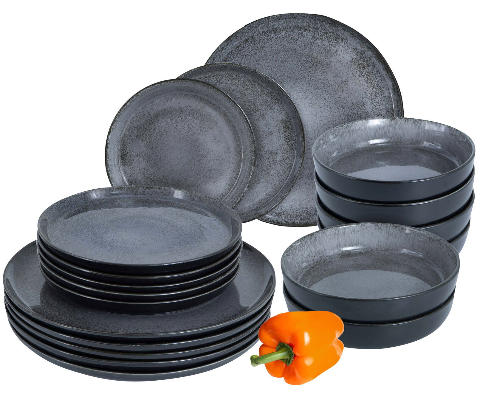 Moritz & Moritz Tellerset Vida Anthrazit 18-tlg. 18-teiliges Tafelservice in Anthrazit mit Tellern und Schalen, seitliche Perspektive, dekoriert mit einer orangefarbenen Paprika
