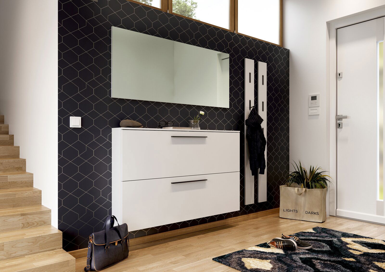 MID.YOU Schuhschrank UTAH Moderner Eingangsbereich mit weißem Schuhschrank und Spiegel, seitliche Perspektive.