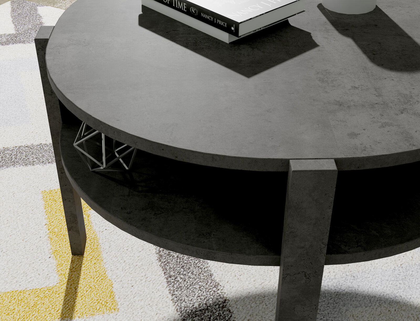 Runder Couchtisch aus dunklem Material mit zwei Ebenen, von oben betrachtet. Auf der oberen Ebene liegen Bücher, die untere Ebene ist leer.