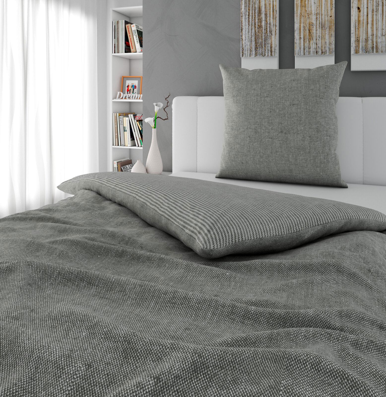 Graue Wendebettwäsche in einem modernen Schlafzimmer, seitliche Perspektive
