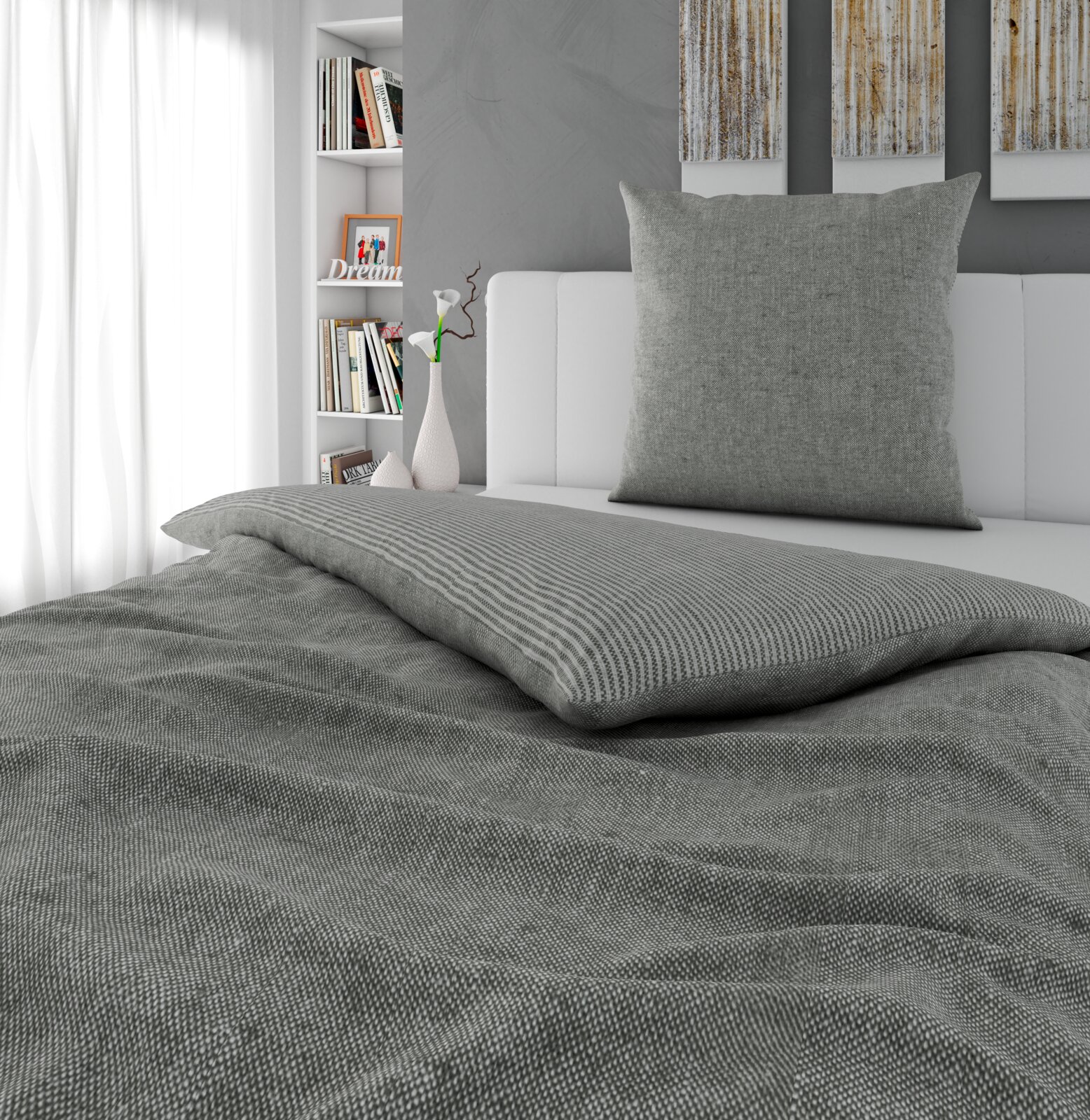 Grijs omkeerbaar beddengoed in een moderne slaapkamer, zijaanzicht