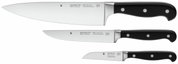 Dreiteiliges Messerset mit schwarzen Griffen, bestehend aus einem großen Kochmesser, einem mittleren Allzweckmesser und einem kleinen Gemüsemesser, seitliche Ansicht.