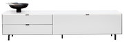Weißes TV-Lowboard mit zwei Schubladen und einer Tür, frontal betrachtet, mit schwarzer Schale auf der linken Seite.